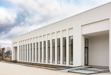 Modern сrematorium building under the blue sky