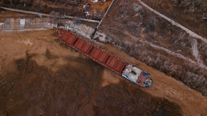 Cargo vessel on the dry riverbed