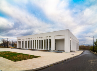 Modern сrematorium building under the blue sky