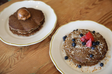 Buckwheat pancakes with berries and coconut  