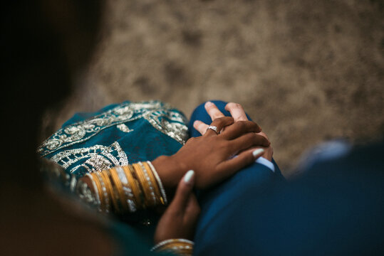 Indian bride holding her husband