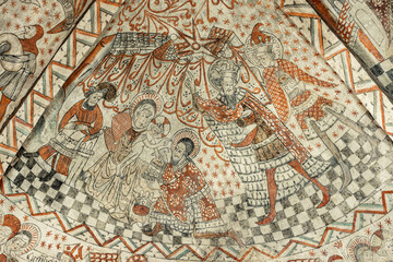 Three Wise Men with their gifts to the christchild, a biblical story in an ancient wall-painting