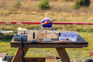 radio-controlled aircraft on the table, flight preparation, RC plane