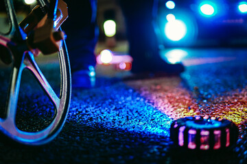 Police conducting the instruction of a crowded for a traffic accident, measuring the stopping...