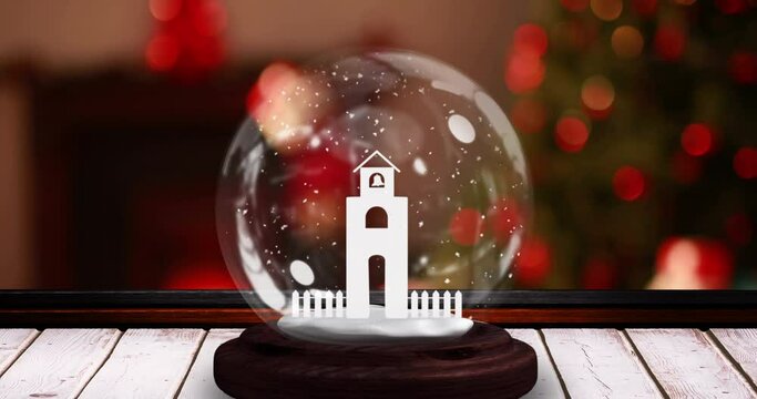 Animation of snow globe with church tower on wooden surface over flickering fairy lights