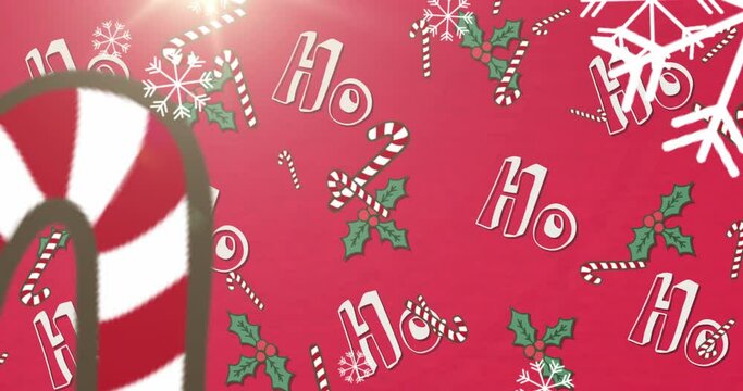 Animation of ho, ho, ho text with christmas presents