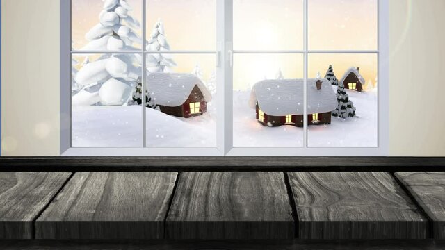 Animation of winter christmas scenery with snow falling over trees and houses seen through window