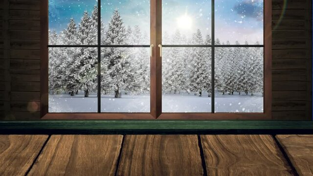 Animation of winter christmas scenery with snow falling over trees and sun shining