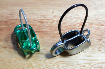 Two belay devices with guide mode function