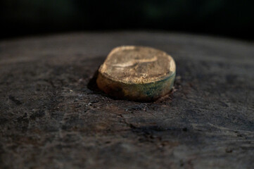 Cork close up, old porto lodge with rows of oak wooden casks for slow aging of fortified ruby or tawny porto wine in Vila Nova de Gaia, Portugal