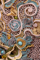 Crochet knitting. Lace of flowers.  Handmade Irish lace as a background