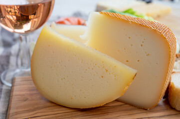 Cheese collection, French fol epi  cheese with many little holes, etorki  and ossau iraty cheese