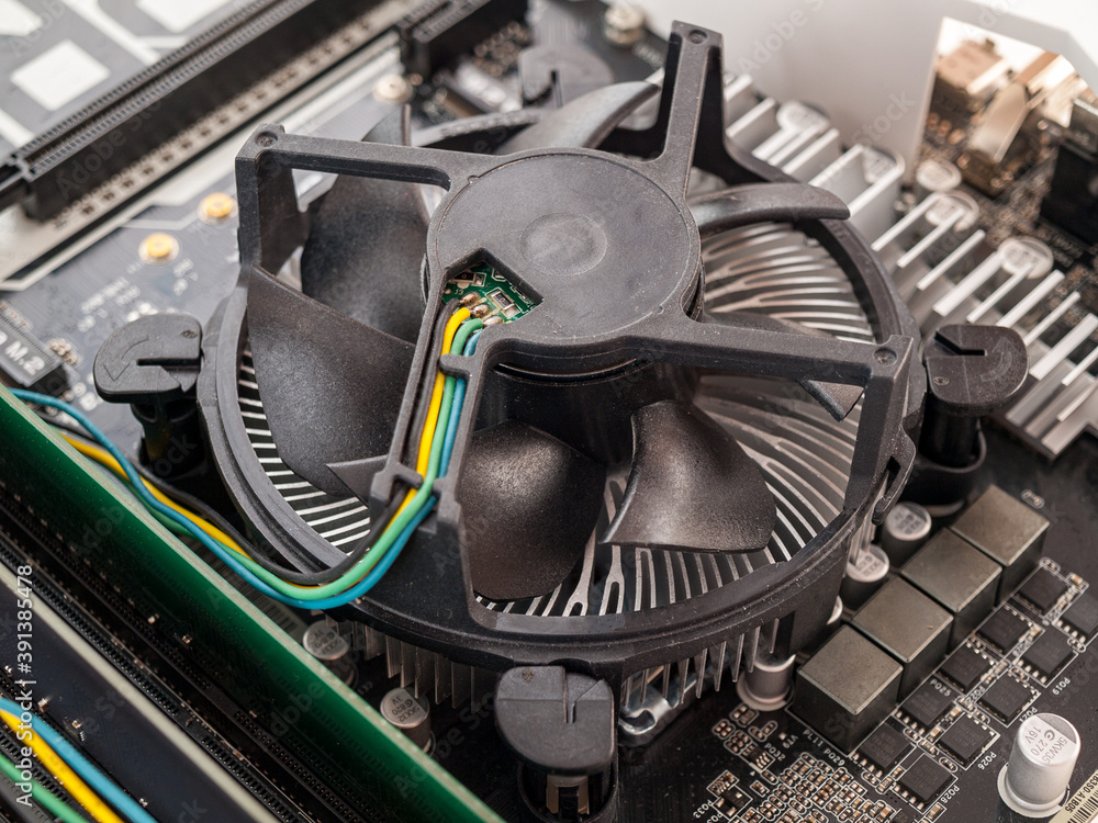 Poster cooling fan with cpu in the computer system unit, cooling the computer air, repair and upgrade, cool