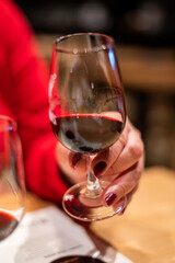 Professional tasting of different fortified dessert ruby, tawny port wines in glasses in porto cellars in Vila Nova de Gaia, Portugal