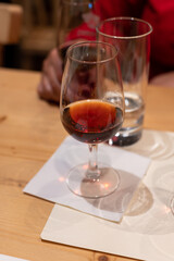 Professional tasting of different fortified dessert ruby, tawny port wines in glasses in porto cellars in Vila Nova de Gaia, Portugal