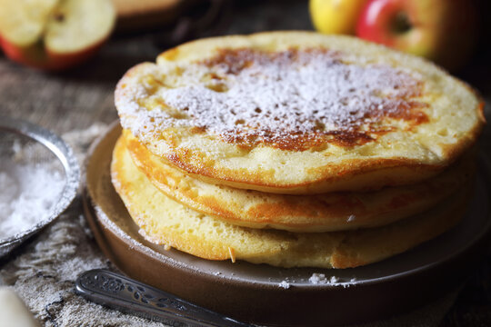French cuisine. Matefaim. Sweet Apple Pancakes, powdered sugar dressing