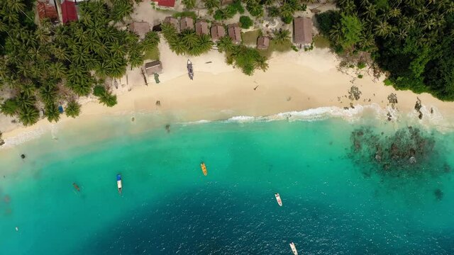 Aerial view of beautiful water and simple houses on Asu Island, North Sumatra, Indonesia