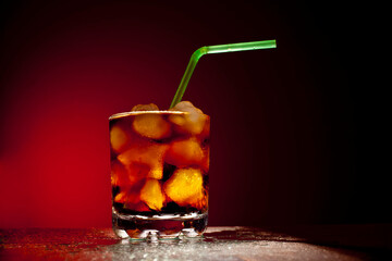 Object of transparent full glass with ice star cubes and sparkling carbonated diet coca coke cola...