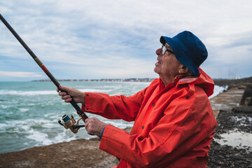 Senior man fishing in the sea.