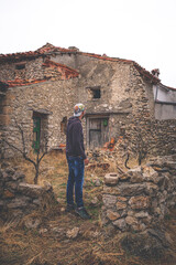 Plakat person standing on a medieval village