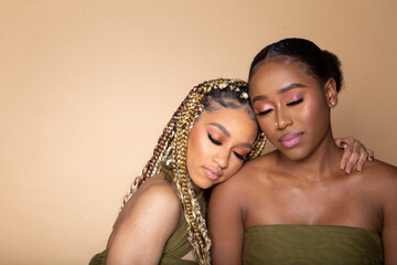 Female best friends studio portrait