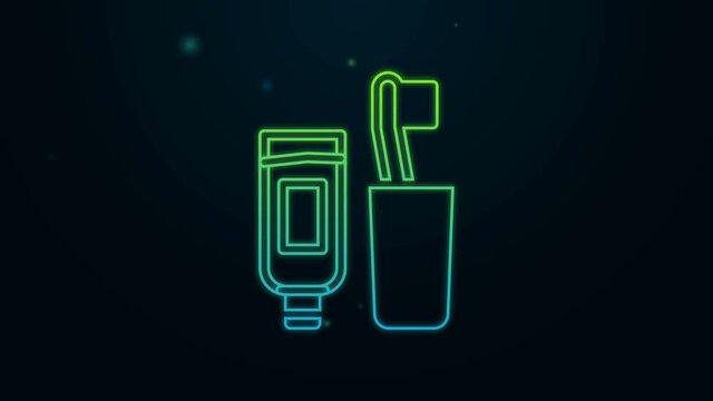 Glowing neon line Toothbrush and tube of toothpaste icon isolated on black background. Disposable bathroom supplies. 4K Video motion graphic animation
