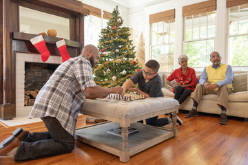 Family playing games during Christmas