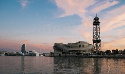 Sunset in the maritime port of Barcelona and in the commercial area