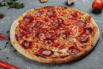 Thinly sliced pepperoni is a popular pizza topping in American-style pizzerias