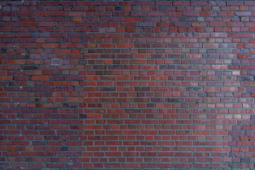 Red and orange tone vintage Bumpy, rough and old brick texture with  English brick bond pattern.
