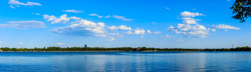 Fototapeta na wymiar Beautiful lake and blue sky with white clouds natural scenery in Beijing.