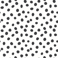 Cute modern hand drawn black polka dots vector seamless pattern on white background. Great for fabric, textile, scrapbooking and wallpaper. Surface pattern design.