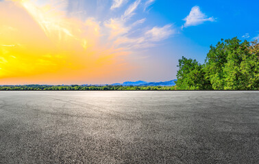 Empty racing track road and green forest with mountain landscape in the suburbs of Beijing.