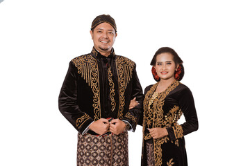 Portrait happy men and women wearing traditional javanese clothes. Couple photo concept isolated on white background