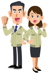 背中合わせでガッツポーズする作業着を着た男女の全身
