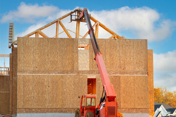 crane work on plywood house
