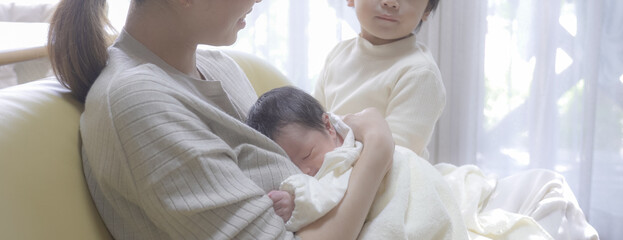 Fototapeta premium 兄弟と母親