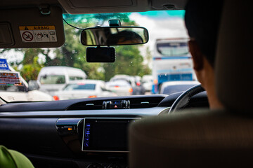 Nakhon Sawan, Thailand, Apr 12, 2019 - Traffic jam on the road during long holiday from inside car view