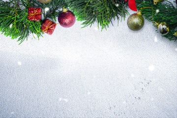Obraz na płótnie Canvas Christmas ornaments and decorations on snow