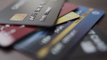 credit bank cards stack on the table.