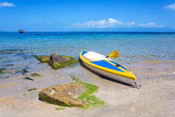 Kayak is anchoring on the beach in Phu Quoc island, Kien Giang province, Vietnam.