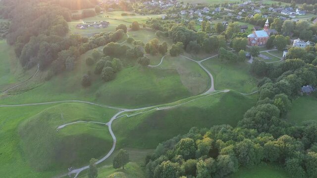 Kernave Archaeological Site, situated in the valley of the River Neris in eastern Lithuania. Drone aerial view. Summer evening