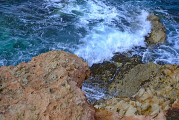 oncoming waves on the coral coast of Cyprus