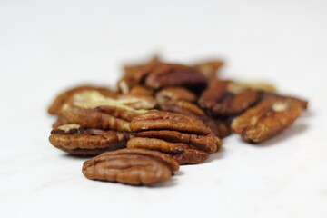 Pecan Nut Halves. Isolated on white background.