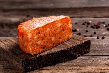 ripening handmade rural cheese on a wooden table, The concept of natural eco dairy products