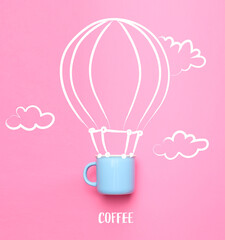 Drawn hot air balloon and cup with word COFFEE on color background