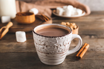 Obraz na płótnie Canvas Cup of hot cacao drink on table