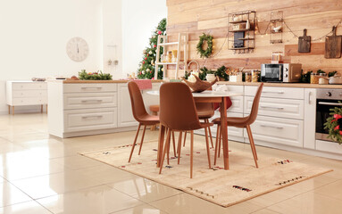 Interior of modern kitchen decorated for Christmas