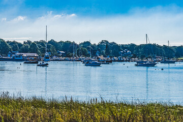 Fototapeta na wymiar Sailboats Yachts Padanaram Harbor Dartmouth Massachusetts