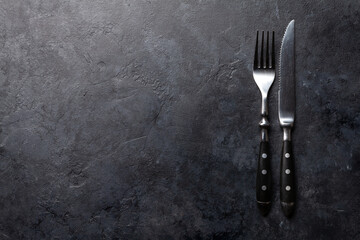 Stone table with knife and fork